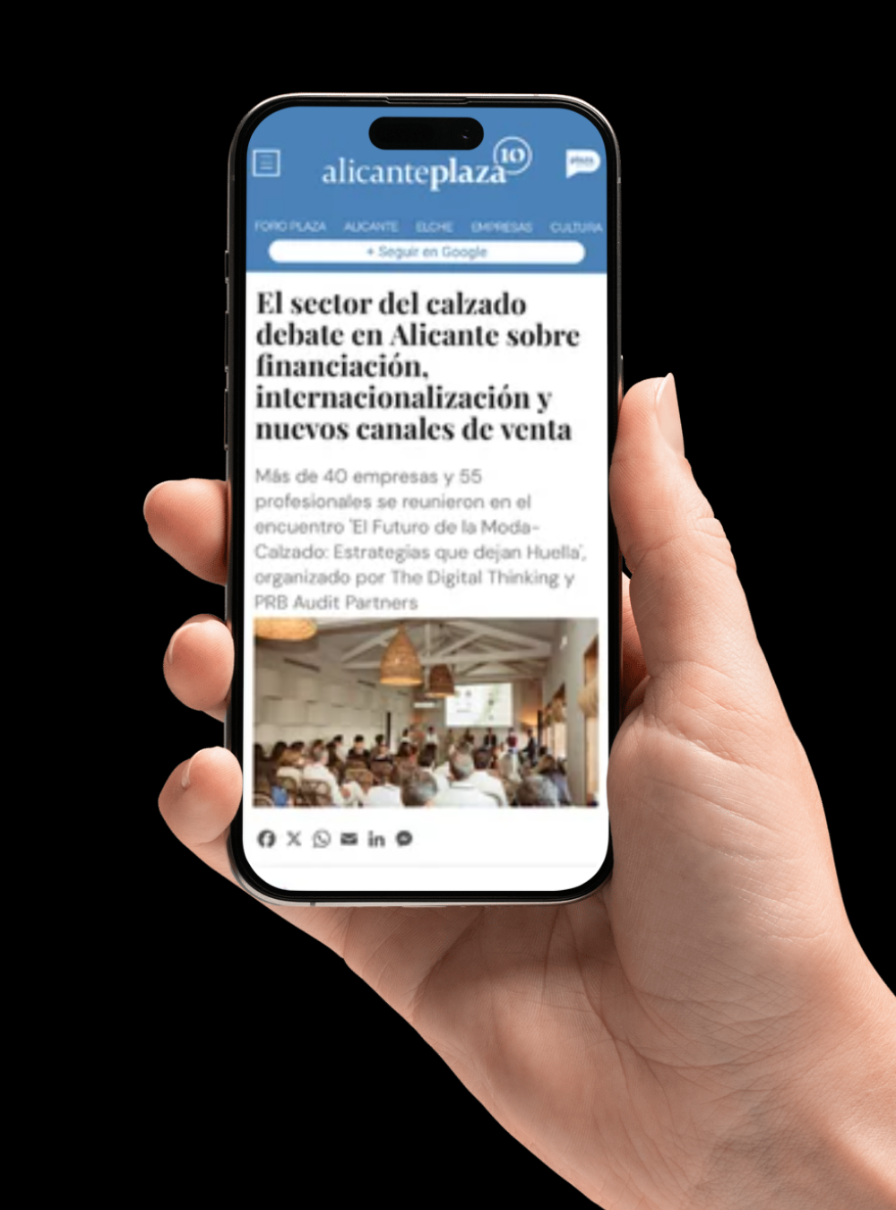 Teléfono móvil mostrando una noticia sobre el sector del calzado